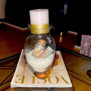 Beautiful vanilla candle decor will $100 bill inside